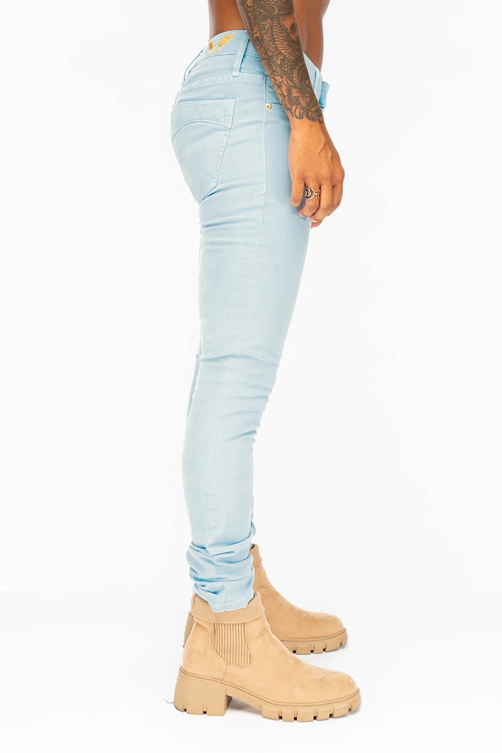 MID RISE WOMENS SKINNY JEANS IN PASTEL BLUE WASH